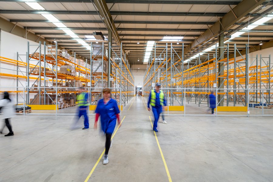 Warehouse team walking through a distribution center
