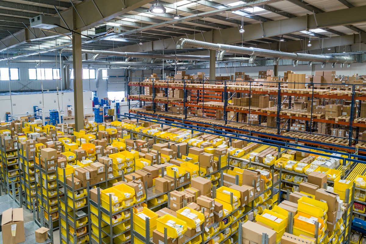 Distribution warehouse floor stacked with palletized inventory
